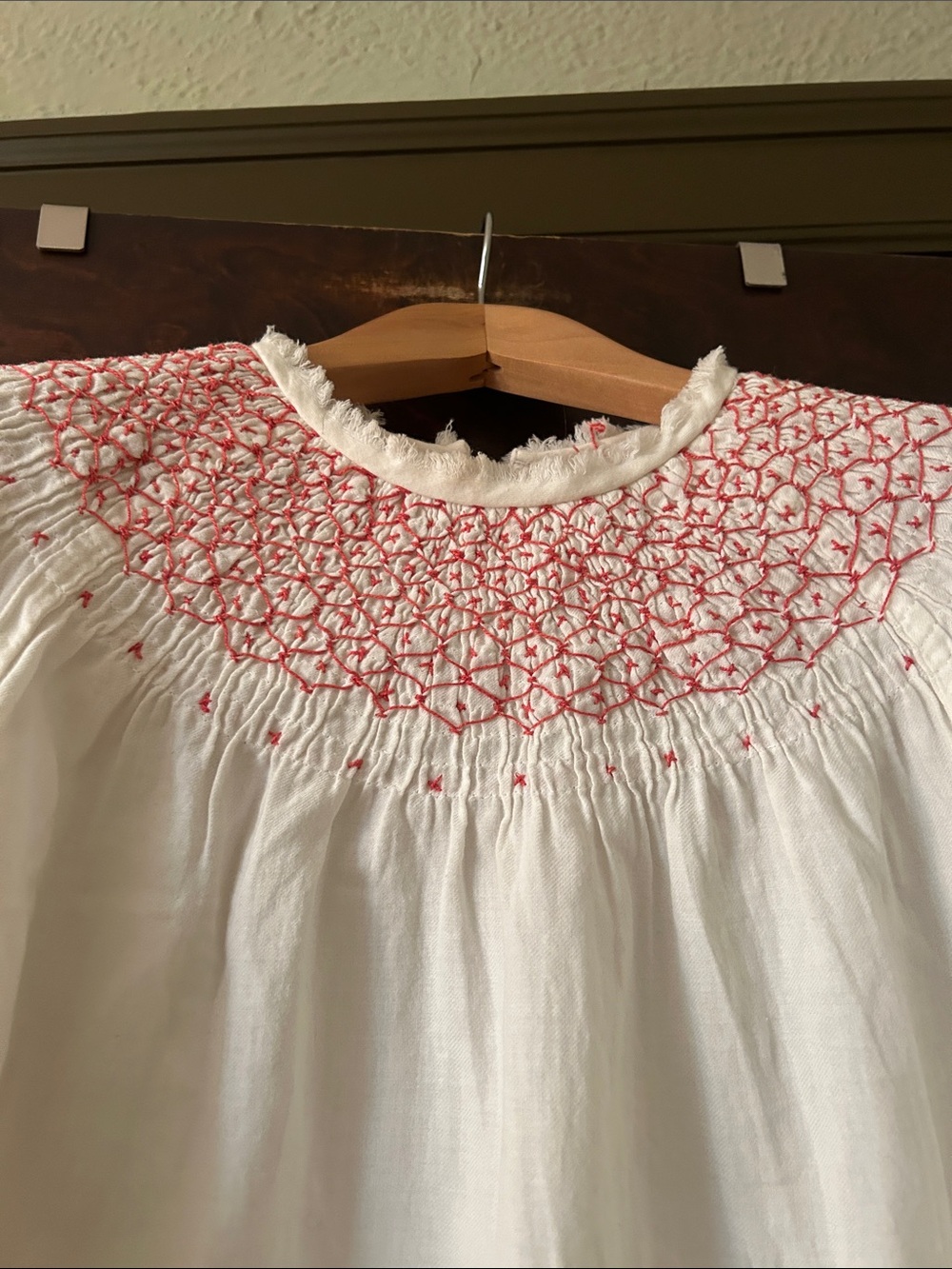White Long-Sleeve Smocked Peasant Top with Pink Embroidery - Picture 2 of 10